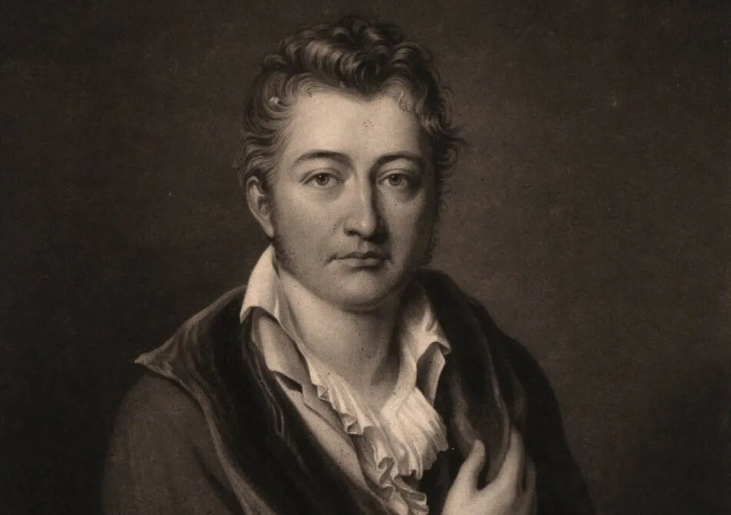 Sepia-toned portrait of a white man in old-fashioned clothes