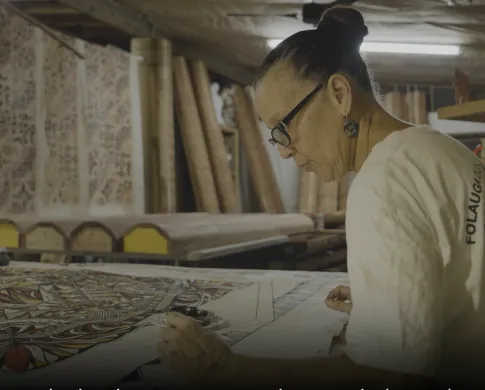 Photo of a person creating a textile